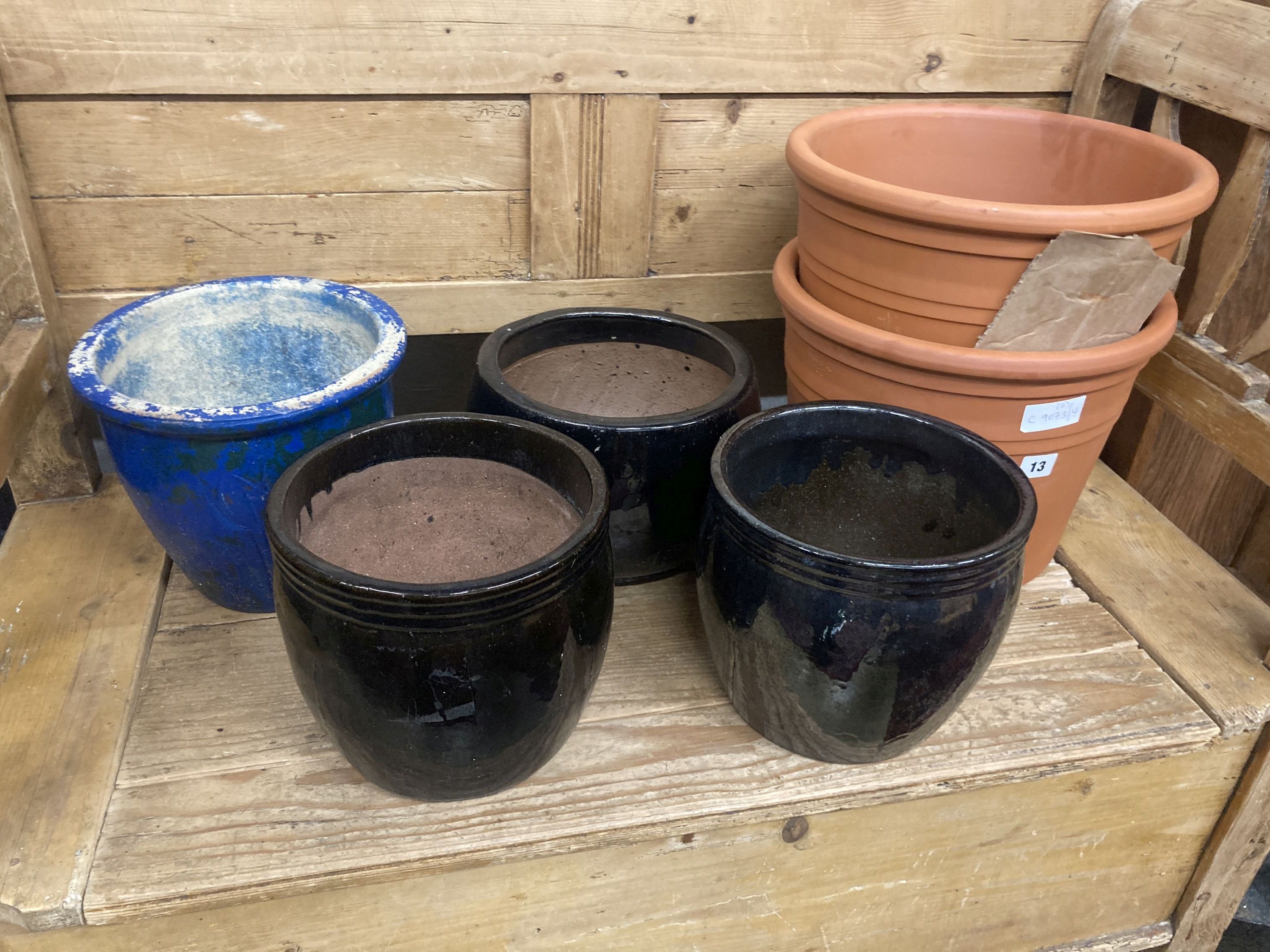 Six assorted garden planters, largest 33cm diameter, height 26cm